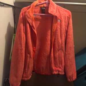 Size Medium. Orange North Face Jacket.